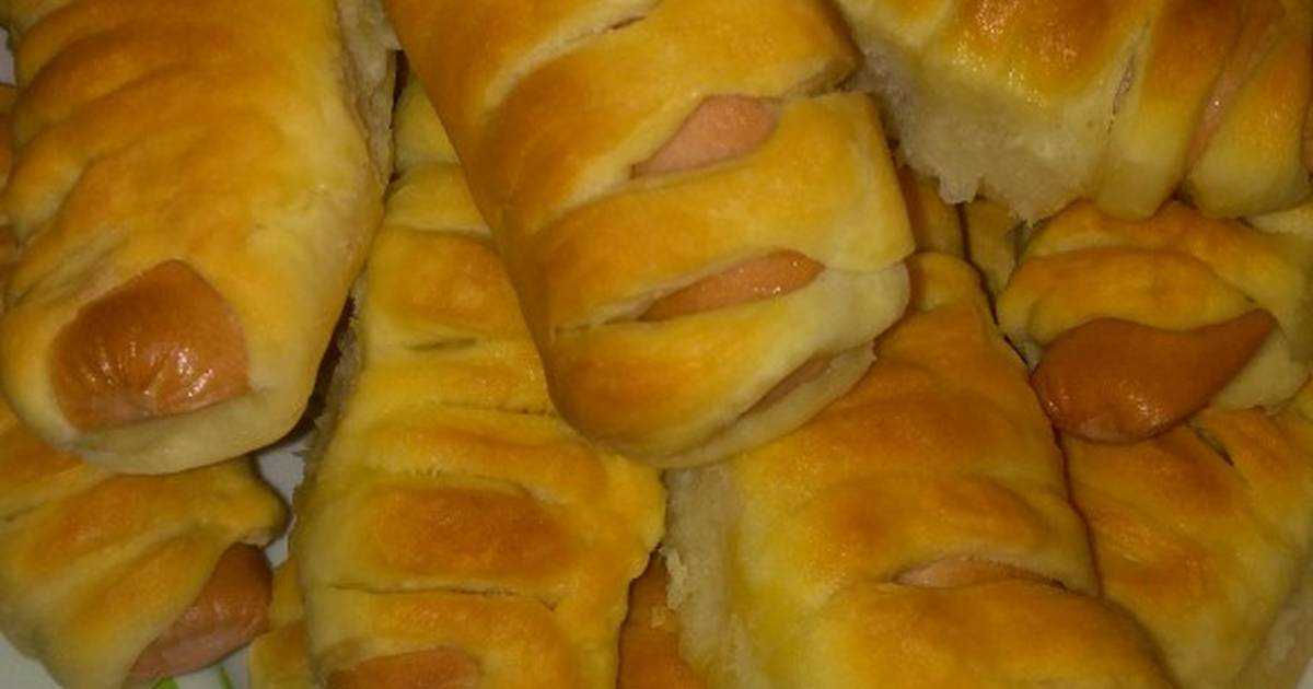 Пирожки с сосиской в духовке рецепт с фото