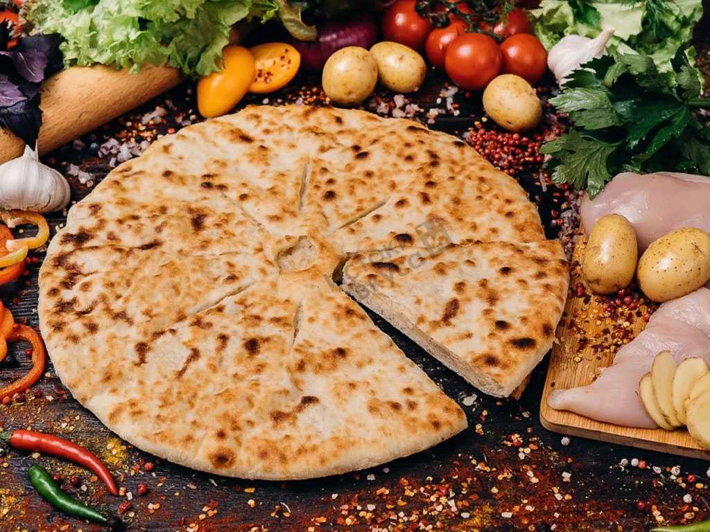 Осетинский пирог с сыром и зеленью на кефире - рецепт с фото
